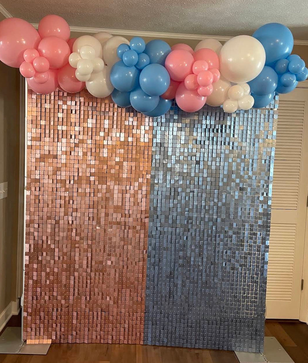 Custom black & silver balloons with silver shimmer wall backdrop